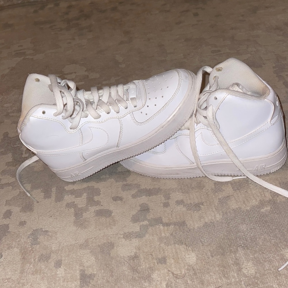 High top white Nikes youth